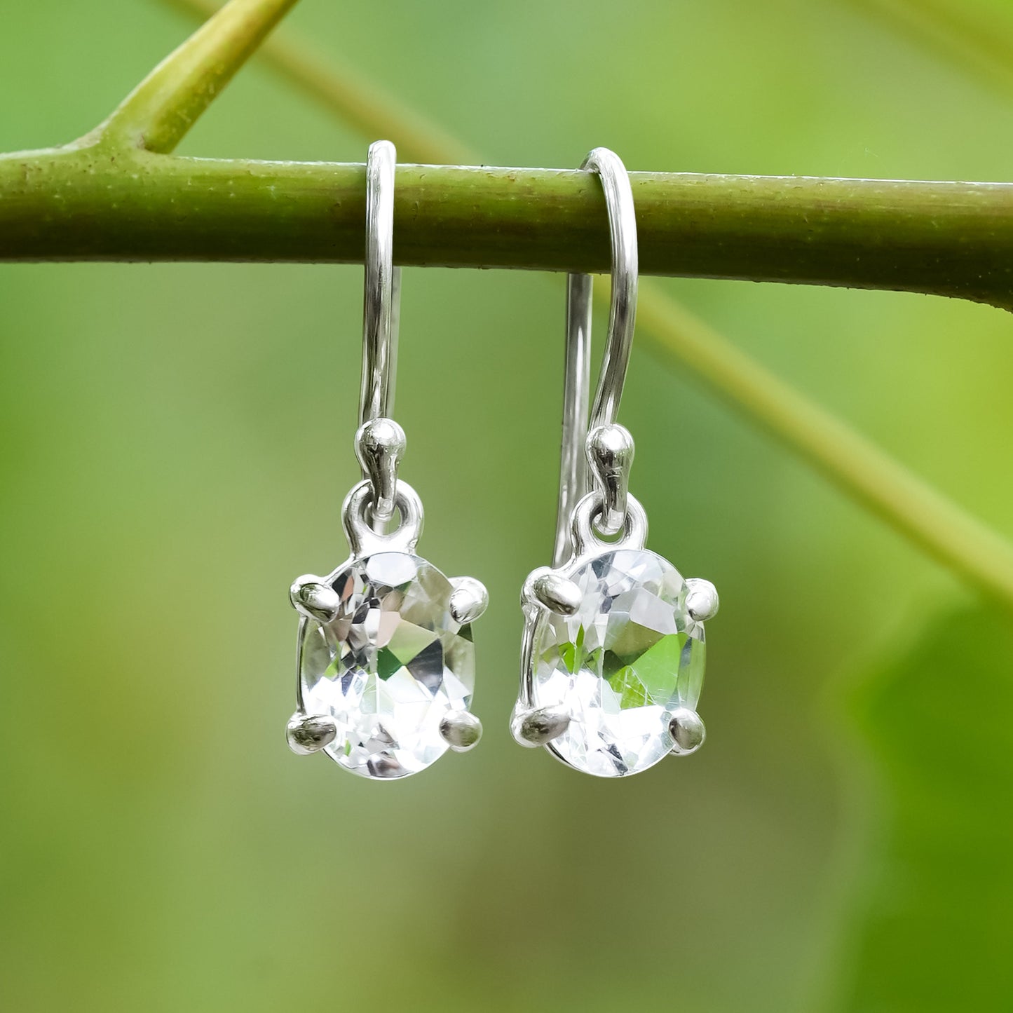 Starborn Danburite Faceted Oval Prong Set Dangle Earrings in Sterling Silver